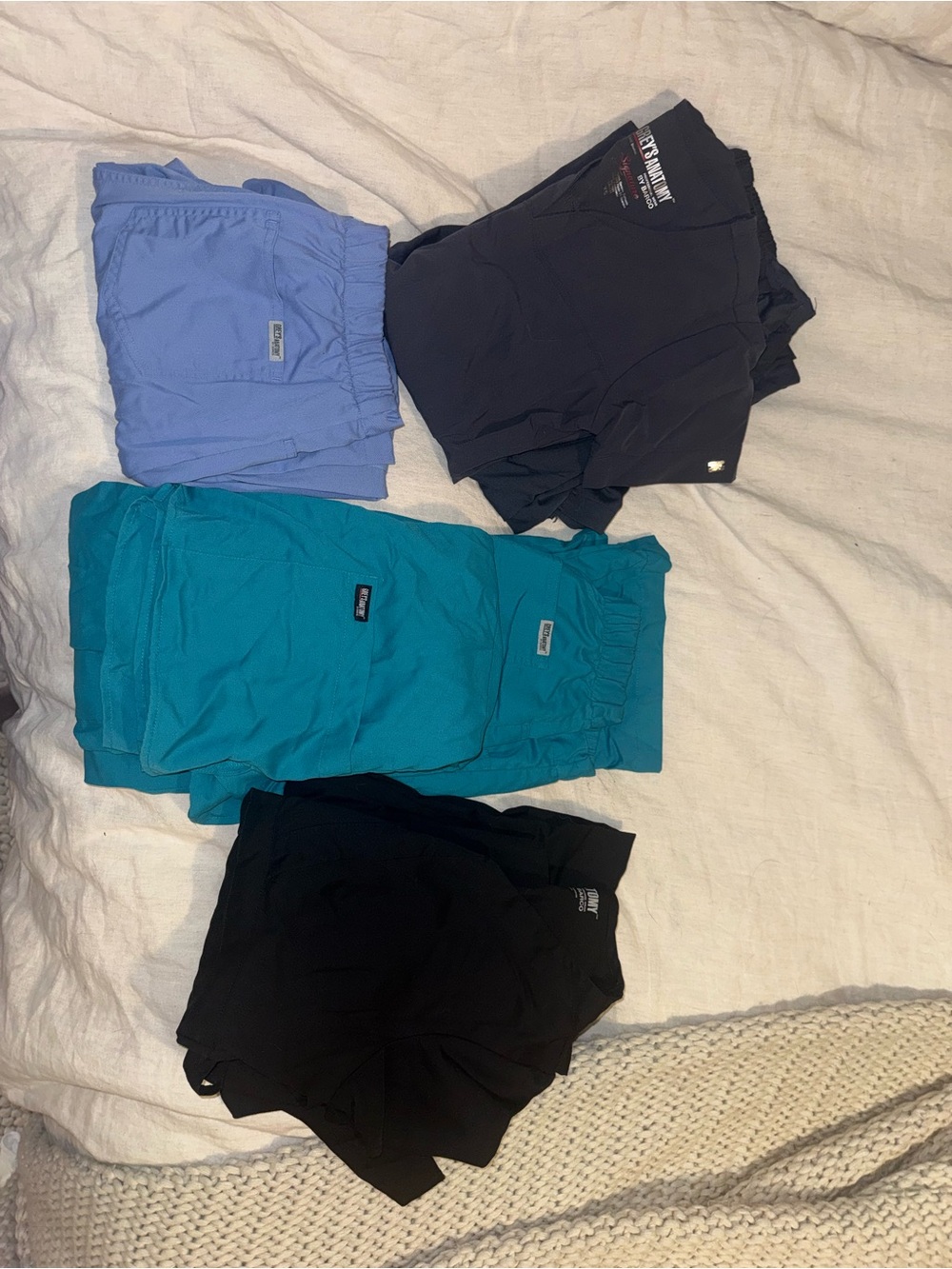 Grey's Anatomy Scrub Pants and Tops in Teal, Light Blue, and Black